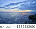 Beautiful sunset sky, blue sea and rocks 113188980