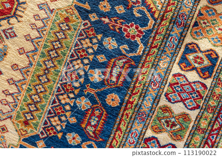 Oriental silk carpet with colorful geometric pattern Oriental silk carpet with colorful geometric pattern 113190022