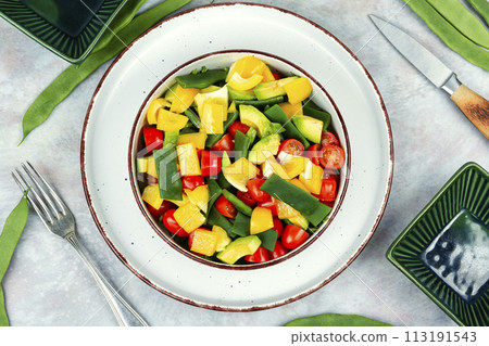 Fresh vegetable salad with runner beans in bowl 113191543
