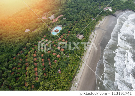 Beach coastline near tropical resort hotel Beach coastline near tropical resort hotel 113191741