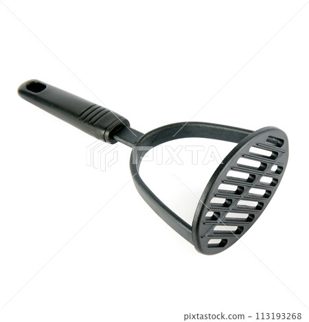 Kitchen potato masher isolated on white. Kitchen potato masher isolated on white. 113193268