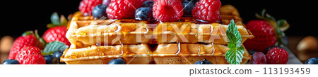 Indulge in the sweet harmony of waffles layered with ripe berries and drizzled with syrup, cafe menu 113193459
