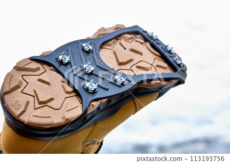 Ice traction cleats fit securely on any shoe or boot and allow you to stride easily on ice and snow-covered pavement and gravel. 113193756