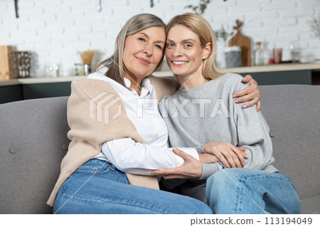 Senior woman with her adult daughter enjoying warm communication 113194049