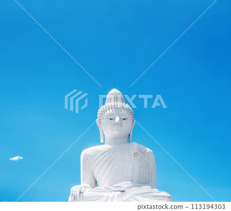 Big Buddha white marble statue by blue sky in Phuket, Thailand Big Buddha white marble statue by blue sky in Phuket, Thailand 113194303
