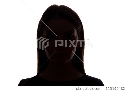 Young woman look ahead with flowing hair - silhouette 113194482