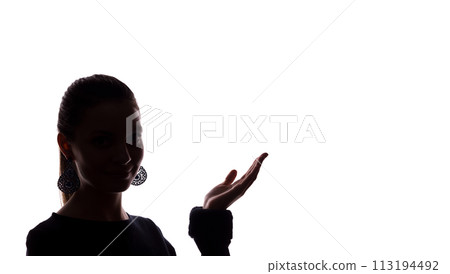 Young woman shows his index finger, hand forward 113194492