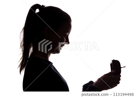 Young girl looks casket with smile, surprise gift silhouette isolate 113194498