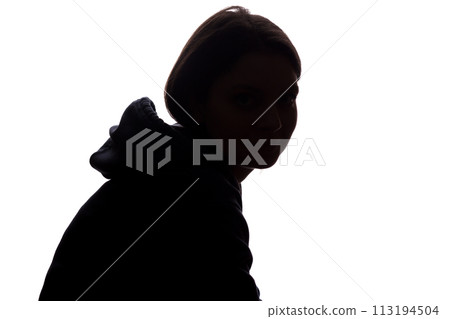 Young woman look ahead with flowing hair - vertical silhouette 113194504