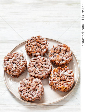 tippaleipa, finnish may day funnel cakes on plate 113195148