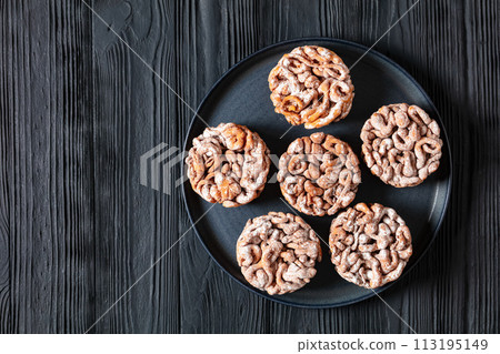 tippaleipa, finnish may day funnel cakes on plate 113195149