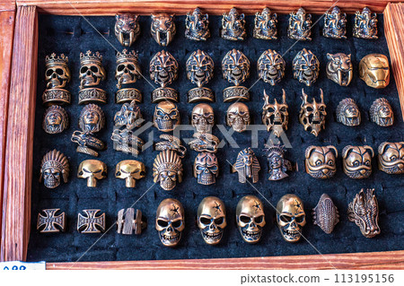 Mens metal funny rings selling on street market Mens metal funny rings selling on street market 113195156