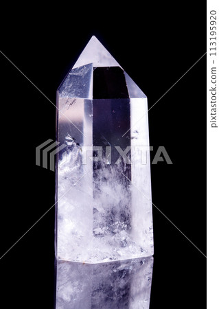 Macro mineral stone Crystal rock crystal on a black background 113195920