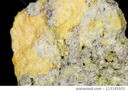 Macro mineral stone Sulfur on black background 113195933