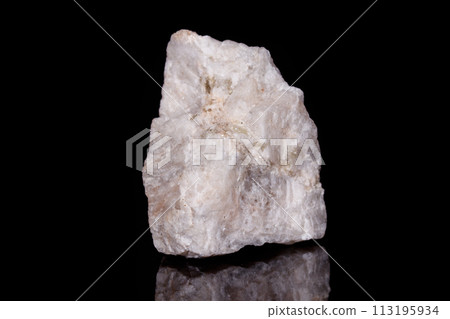 Macro mineral stone Wollastonite on black background Macro mineral stone Wollastonite on black background 113195934