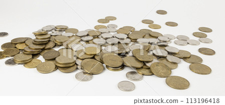 Scattered table coins, Ukrainian national currency, hryvnia. The concept of putting away baskets for old age. Scattered table coins, Ukrainian national currency, hryvnia. The concept of putting away baskets for old age. 113196418