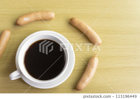 Wiener sausage and black coffee 113196449