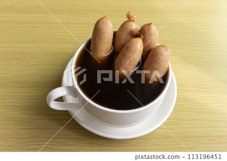 Wiener sausage and black coffee 113196451