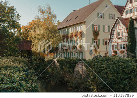 Old national German town house in Bietigheim-Bissingen, Baden-Wuerttemberg, Germany, Europe. Old Town is full of colorful and well preserved buildings. Old national German town house in Bietigheim-Bissingen, Baden-Wuerttemberg, Germany, Europe. Old Town is full of colorful and well preserved buildings. 113197859