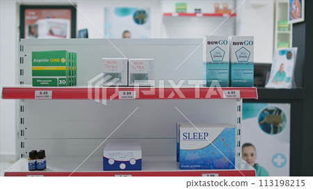 Empty drugstore shelves filled with medical supplies and pills, to sell prescription medicine or treatment to customers. Pharmacy store with medication and vitamins, painkillers and nutrients. Empty drugstore shelves filled with medical supplies and pills, to sell prescription medicine or treatment to customers. Pharmacy store with medication and vitamins, painkillers and nutrients. 113198215