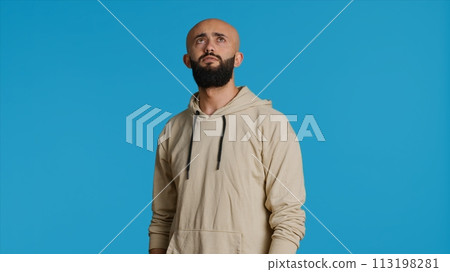 Muslim person looking at information on a hologram, trying to create new slideshow with holographic projection on artificial intelligence metaverse. Young adult using holograph image. Camera 1. 113198281