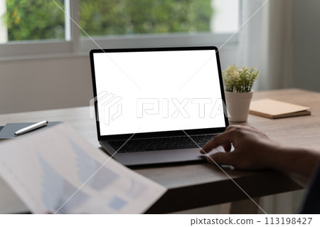 young man working Businessman using a desktop computer of the blank screen young man working Businessman using a desktop computer of the blank screen 113198427