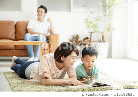 Reading with parents and children Living room Reading with parents and children Living room 113198623