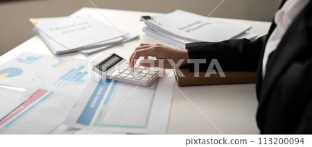 Documents, Business woman and accountant reading report for information, financial data or analysis. Paperwork, auditor check, review and bookkeeping, Calculate finance and tax in office Documents, Business woman and accountant reading report for information, financial data or analysis. Paperwork, auditor check, review and bookkeeping, Calculate finance and tax in office 113200094