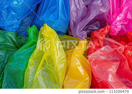 Colored plastic bags highlighting waste issues. Environmental Concern Concept Colored plastic bags highlighting waste issues. Environmental Concern Concept 113200470