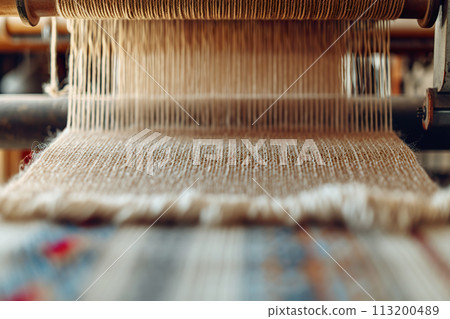 Handwoven textiles on traditional loom. Artisanal fashion, fabrics production 113200489