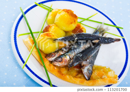 Roasted pilchards with potato balls and focaccia 113201700