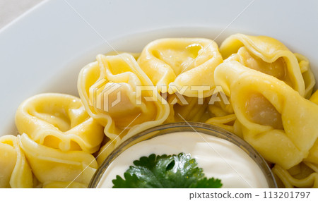 Boiled ravioli with mayonnaise 113201797