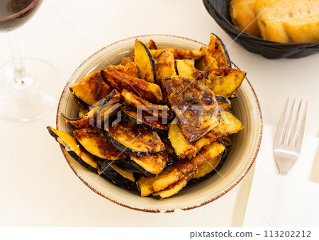 Fried eggplant with honey, classic Andalusian dish 113202212