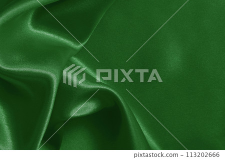 Dark green fabric cloth texture for background and design art work, beautiful crumpled pattern of silk or linen. 113202666
