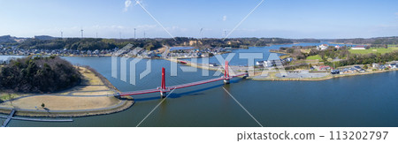 Drone | Panoramic shot | Aerial shot of the glowing red Iris Bridge over Lake Kitagata | Awara City, Fukui Prefecture Drone | Panoramic shot | Aerial shot of the glowing red Iris Bridge over Lake Kitagata | Awara City, Fukui Prefecture 113202797