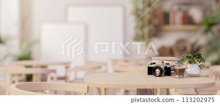 A space for display products on a wooden table in a beautiful minimalist restaurant of coffee shop. A space for display products on a wooden table in a beautiful minimalist restaurant of coffee shop. 113202975