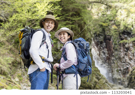 A couple enjoying hiking A couple enjoying hiking 113203041
