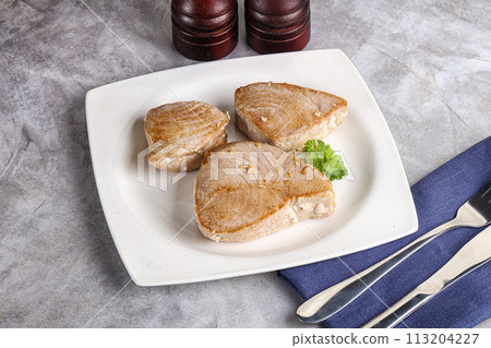 Roasted red tuna steak in the plate 113204227