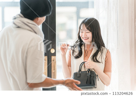 A young woman visits, enters, and leaves a beauty salon/hair salon for hair quality improvement/hair straightening/treatment (hair quality/texture) A young woman visits, enters, and leaves a beauty salon/hair salon for hair quality improvement/hair straightening/treatment (hair quality/texture) 113204626