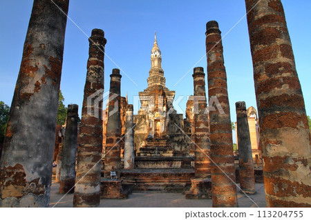 Sukhothai, the ancient capital of northern Thailand, Sukhothai Historical Park, a world cultural heritage site, pagodas and statues of Wat Mahathat temple ruins 113204755