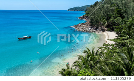 Aerial view banana beach white tropical beach with long-tail boat and palm tree in banana beach, Tropical beach with clear water at Banana beach, Phuket, Thailand. Aerial view banana beach white tropical beach with long-tail boat and palm tree in banana beach, Tropical beach with clear water at Banana beach, Phuket, Thailand. 113205279