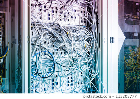 server inside data center with ethernet cables connected to data switch 113205777