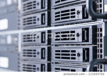 Row of hard disks used for data storage in internet data center 113205782