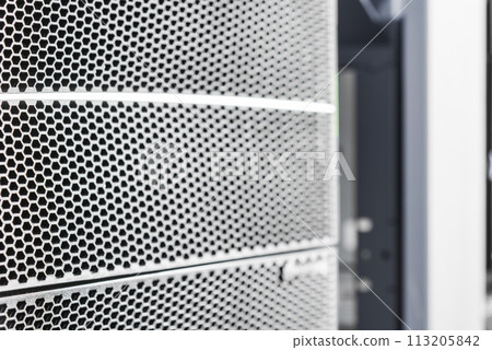 detail of rack datacenter holding cluster of hard-drives 113205842