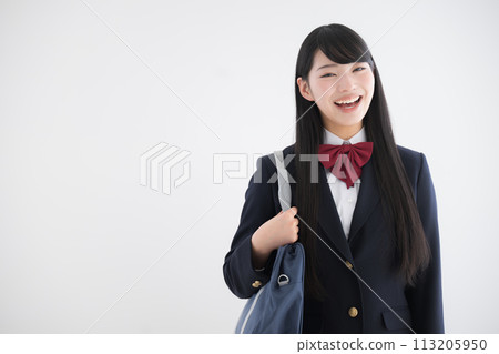 A high school girl smiling from the front looking at the camera on an easy-to-use white background, with green blur in front, upper body close-up A high school girl smiling from the front looking at the camera on an easy-to-use white background, with green blur in front, upper body close-up 113205950