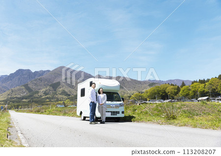 couple traveling by camper 113208207