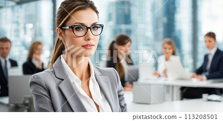 A businesswoman elegantly poised with speed motion blur effect highlighting movement A businesswoman elegantly poised with speed motion blur effect highlighting movement 113208501