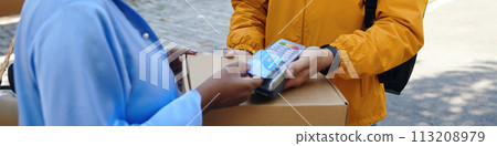 Header with woman paying for express delivery 113208979
