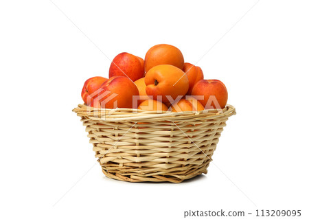 PNG,Fresh apricots in a basket, isolated on white background 113209095