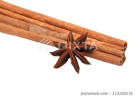 Cinnamon spice sticks isolated on the white Cinnamon spice sticks isolated on the white 113209216